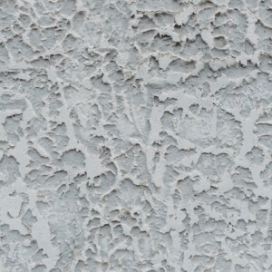 abstract background of textured aged stucco wall